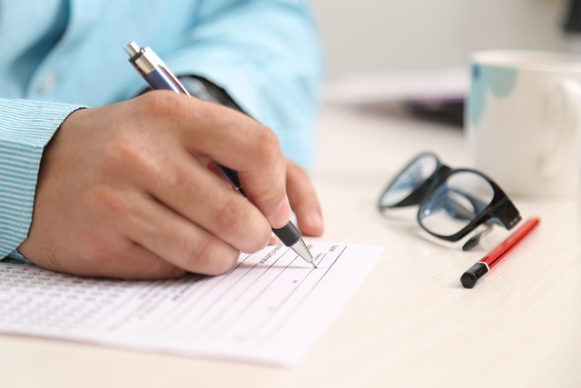 a person filling out a rental application form